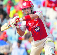  Kings XI Punjab's Mandeep Singh plays a shot during their match against Chennai Super Kings in Chennai on Saturday. 