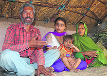 Reena Kumari along with her son, father and mother at Narangpur village in Jalandhar.