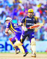 Kolkata Knight Riders� Gautam Gambhir (R) and Brendon McCullum run between wickets at The Eden Gardens in Kolkata on Saturday