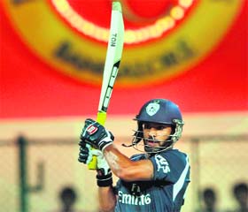 Deccan Chargers� Shikhar Dhawan hits a shot at the M Chinnaswamy Stadium in Bangalore on Sunday