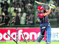 Delhi Daredevils' Yogesh Nagar is bowled by Brett Lee during their match against Kolkata Knight Riders in New Delhi on Monday. 