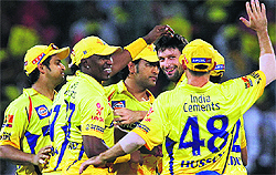 Chennai Super Kings' Ben Hilfenhaus celebrates along with teammates the wicket of Delhi Daredevils' Virender Sehwag during their match in Chennai on Saturday. Chennai won the match by nine wickets