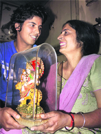 Judoka Garima Chaudhary with her mother at her residence in Meerut on Sunday. Garima qualified for the London Olympics in the 63kg category
