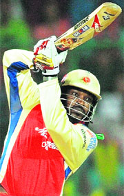 Royal Challengers Bangalore�s Chris Gayle plays a shot at the Ferozeshah Kotla in Delhi on Thursday. 