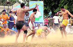 Inmates in action during a match in the Patiala Central Jail on Saturday