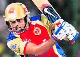 Royal Challenger Bangalore�s skipper Virat Kohli plays a shot during their match against Deccan on Sunday