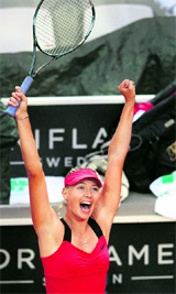Russia's Maria Sharapova celebrates after winning her final match against China's Na Li at the Italian Open in Rome on Sunday.