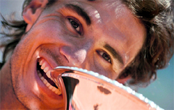 Spain�s Rafael Nadal celebrates with the trophy after winning the Rome Tennis Masters on Monday.