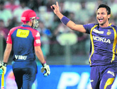 Delhi Daredevils batsman Virender Sehwag walks back after getting out during the IPL�s first play-off match against Kolkata Knight Riders in Pune. 