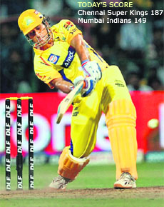  Chennai skipper MS Dhoni plays a shot during a play-off match against Mumbai Indians. 