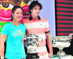 Chinese player Li Na (L) and Spanish player Rafael Nadal take part in the draw for the French Open tennis tournament at the Roland Garros stadium in Paris on Friday. � AFP