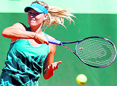 Russia�s Maria Sharapova takes part in a training session a day before the start of the French Open at the Roland Garros stadium in Paris on Saturday