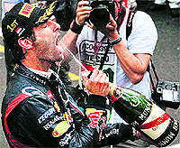 Red Bull Formula One driver Mark Webber of Australia celebrates after winning the Monaco F1 Grand Prix on Sunday