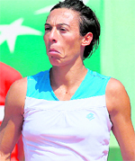 Francesca Schiavone reacts after losing a point against Varvara Lepchenko during their match at the Roland Garros stadium in Paris on Saturday.
