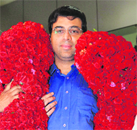 World chess champion Viswanathan Anand being welcomed at the Chennai airport on Saturday.