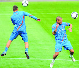 Netherlands� Wesley Sneijder (R) controls the ball at a training session at Wisla Stadium in Krakow. Netherlands face Denmark in the opening game of Group B on Saturday. 