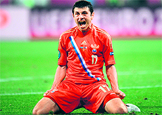 Russia�s Alan Dzagoev celebrates after scoring the third goal against Czech Republic at the Municipal stadium in Wroclaw on Friday. Russia won 4-1
