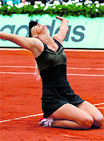 Maria Sharapova reacts after beating Sara Errani during their final match of the French Open in Paris on Saturday