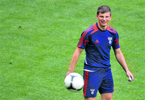 Russia�s Andrey Arshavin smiles during a training session at the Municipal stadium in Wroclaw.