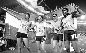 A file photo of Manjit Kaur (second from right) with her team after winning 4x400m relay gold during CWG in 2010.