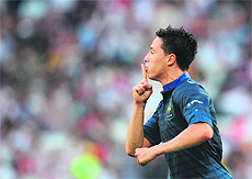 French midfielder Samir Nasri reacts after scoring against England at the Donbass Arena in Donetsk on Monday. The match ended 1-1