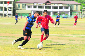 Players in action during the Mandi Hot-Weather Football Tournament on Friday. 