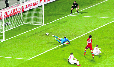 Czech Republic�s Petr Jiracek (No. 19) scores past Poland�s goalkeeper Przemyslaw Tyton during their match in Wroclaw on Saturday. 