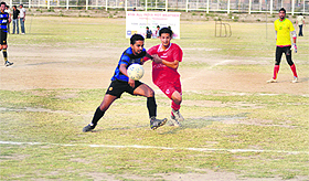 DFA Hoshiarpur and Punjab Police players vie for the ball in the final on Sunday. Punjab Police won 3-2.
