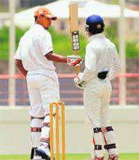West Indies A�s Kieran Powell celebrates his half century against India A on the second day of their 3rd unofficial Test in St. Lucia on Sunday