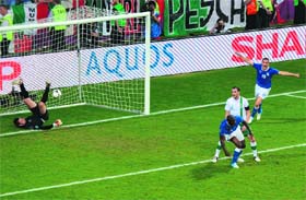 Italian forward Mario Balotelli (C) scores past Irish goalkeeper Shay Given (L) during their match at the Municipal Stadium in Poznan on Monday. Italy won 0-2.