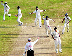 Sri Lankan players celebrate after winning the first Test against Pakistan in Galle on Monday