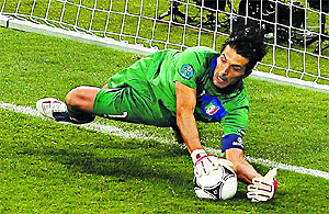 Italy�s Gianluigi Buffon saves a penalty kick during their quarterfinal match against England in Kiev