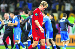 England�s goalkeeper Joe Hart reacts after losing to Italy
