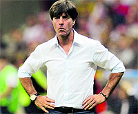 German head coach Joachim Loew grimaces during their semifinal against Italy on Thursday