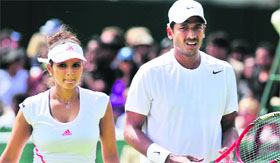 Sania Mirza (L) and Mahesh Bhupathi react after losing their mixed doubles match against Paul Hanley and Alla Kudryavtseva at the All England Tennis Club in Wimbledon on Saturday.