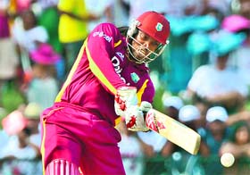 Chris Gayle of the West Indies hits out during the first T20 match against New Zealand in Lauderhill