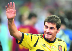 Iker Casillas waves to the crowd after Spain won the final in Kiev on Sunday. 