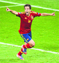 Spanish defender Jordi Alba celebrates after scoring against Italy in Kiev on Sunday.