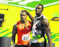 Jamaican sprinter Usain Bolt (R) congratulates Yohan Blake for his victory in the men�s 200m sprint final of the Jamaican Olympic Athletic Trials at the National Stadium in Kingston on Sunday.