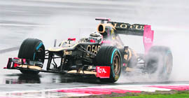 Lotus F1 Team's Finnish driver Kimi Raikkonen drives during the first practice session at the Silverstone circuit for the British Grand Prix on Friday.  