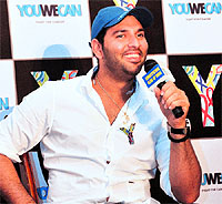 Yuvraj Singh talks to journalists during a YouWeCan event for the Yuvraj Singh Cancer Foundation in New Delhi on Saturday