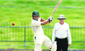 Pakistan's Asad Shafiq plays a shot during the first day of their third and final Test against Sri Lanka in Pallekele on Sunday. 