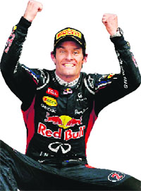 Mark Webber celebrates his wn at the British F1 GP