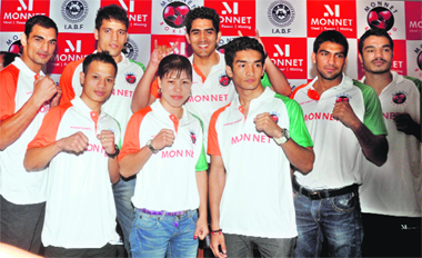 Indian boxers Jai Bhagwan, Shiva Thapa, Sumit Sangwan, MC Mary Kom, Vijender Singh, Devendro Singh, Manoj Kumar and Vikas Krishan during a send-off ceremony for the London Olympics in New Delhi on Thursday.