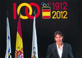 Tennis player Rafael Nadal, the official Spanish flag barrier at the London Olympics, speaks during a ceremony in Madrid on Saturday
