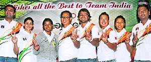 Indian archers Jayanta Talukdar, Rahul Banerjee, Tarundeep Rai, Laishram Bombayla Devi, Chekrovolu Swuro and Deepika Kumari with Indian badminton players Ashwini Ponnappa and Valiyaveetil Diju during a farewell ceremony in New Delhi on Sunday