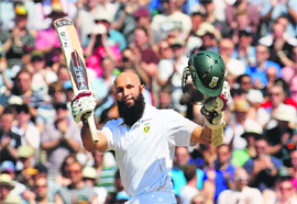 Hashim Amla celebrates the mark of 200 during his innings of 311 at the Oval in London on Sunday