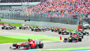 Ferrari's Fernando Alonso leads after the start of the German Formula One Grand Prix in Hockenheim on Sunday. Alonso won the race