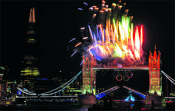 Fireworks explode over the Tower Bridge in London as part of the opening ceremony of the London 2012 Olympic Games