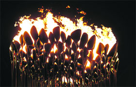 The Olympic cauldron is lit during the opening ceremony.